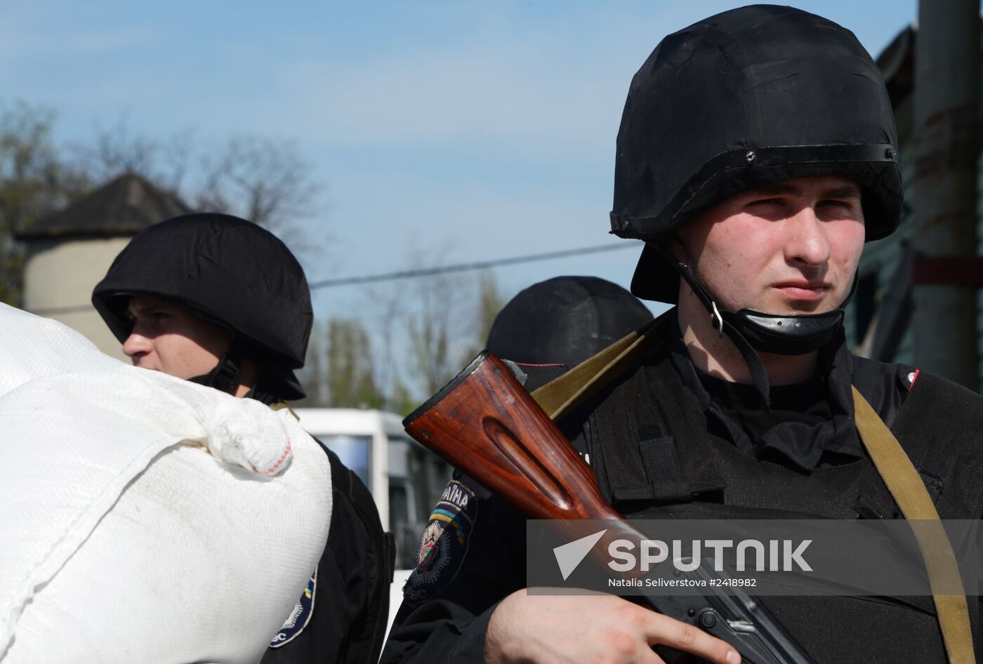 Ukrainian police officers at traffic checkpoint