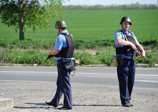 Ukrainian police officers at traffic checkpoint