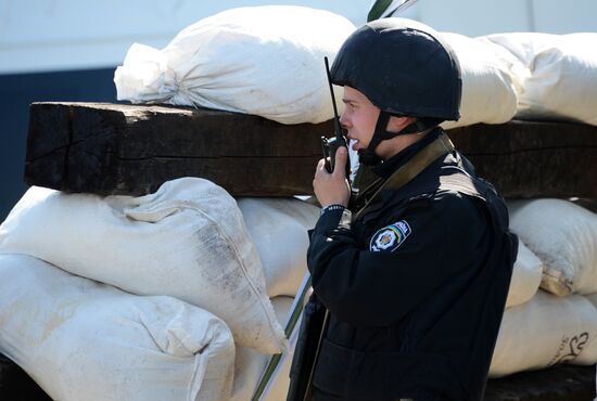 Ukrainian police officers at traffic checkpoint