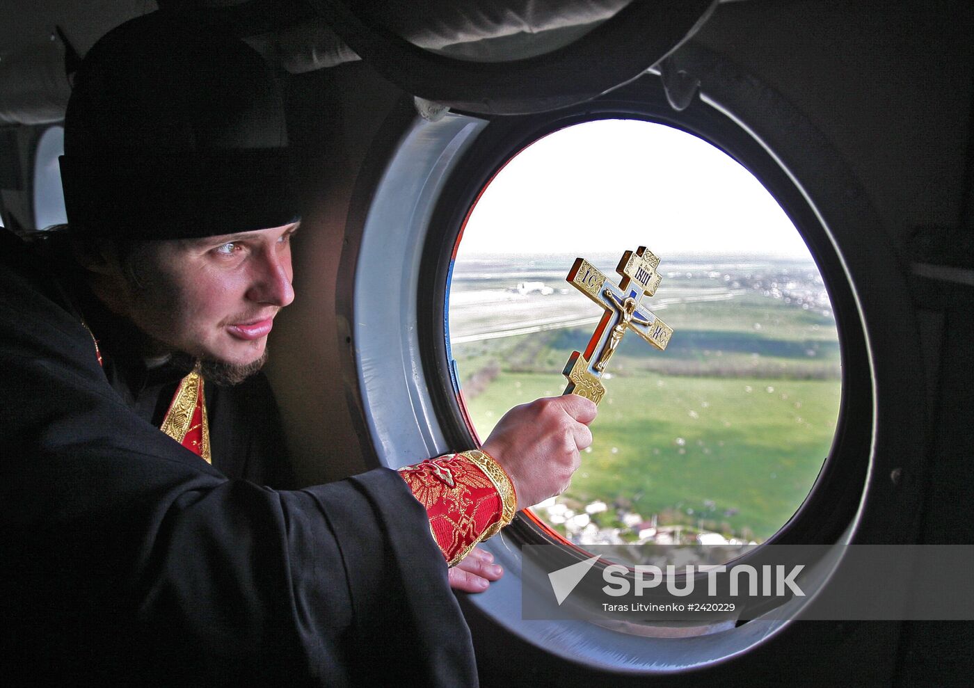 Consecrating Crimean territory from an Emergencies Ministry helicopter