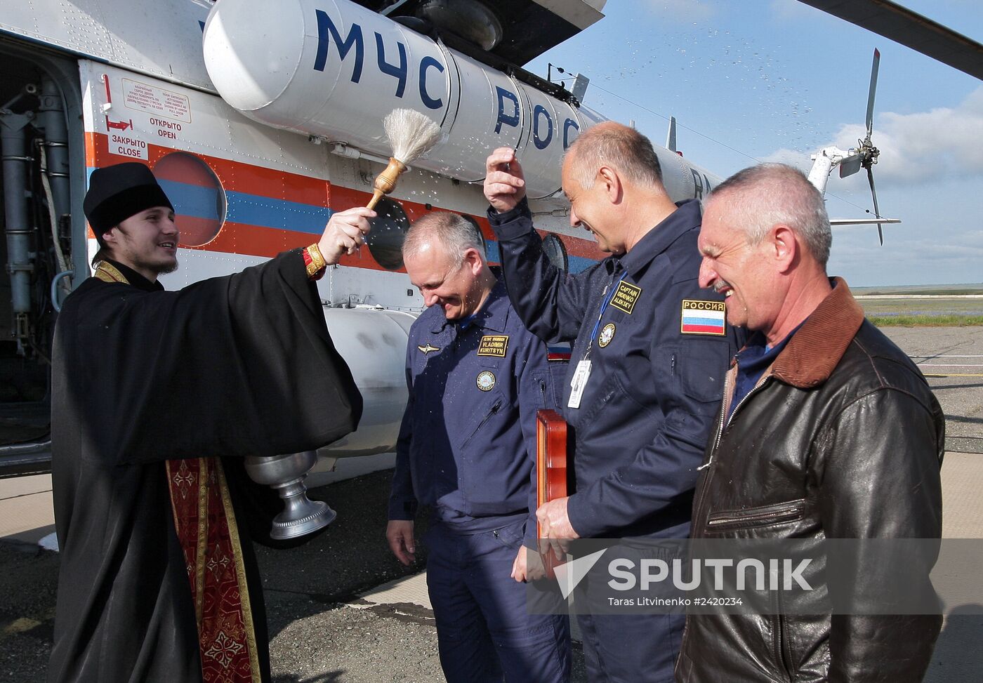 Consecrating Crimean territory from an Emergencies Ministry helicopter