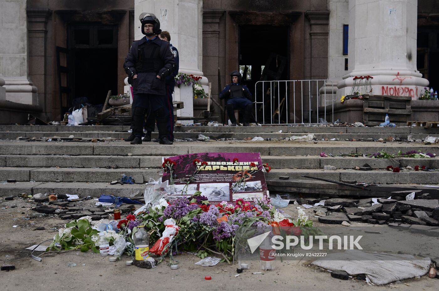 Flowers to commemorate memory of those who died from fire at Odessa's House of Trade Unions