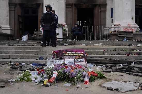 Flowers to commemorate memory of those who died from fire at Odessa's House of Trade Unions