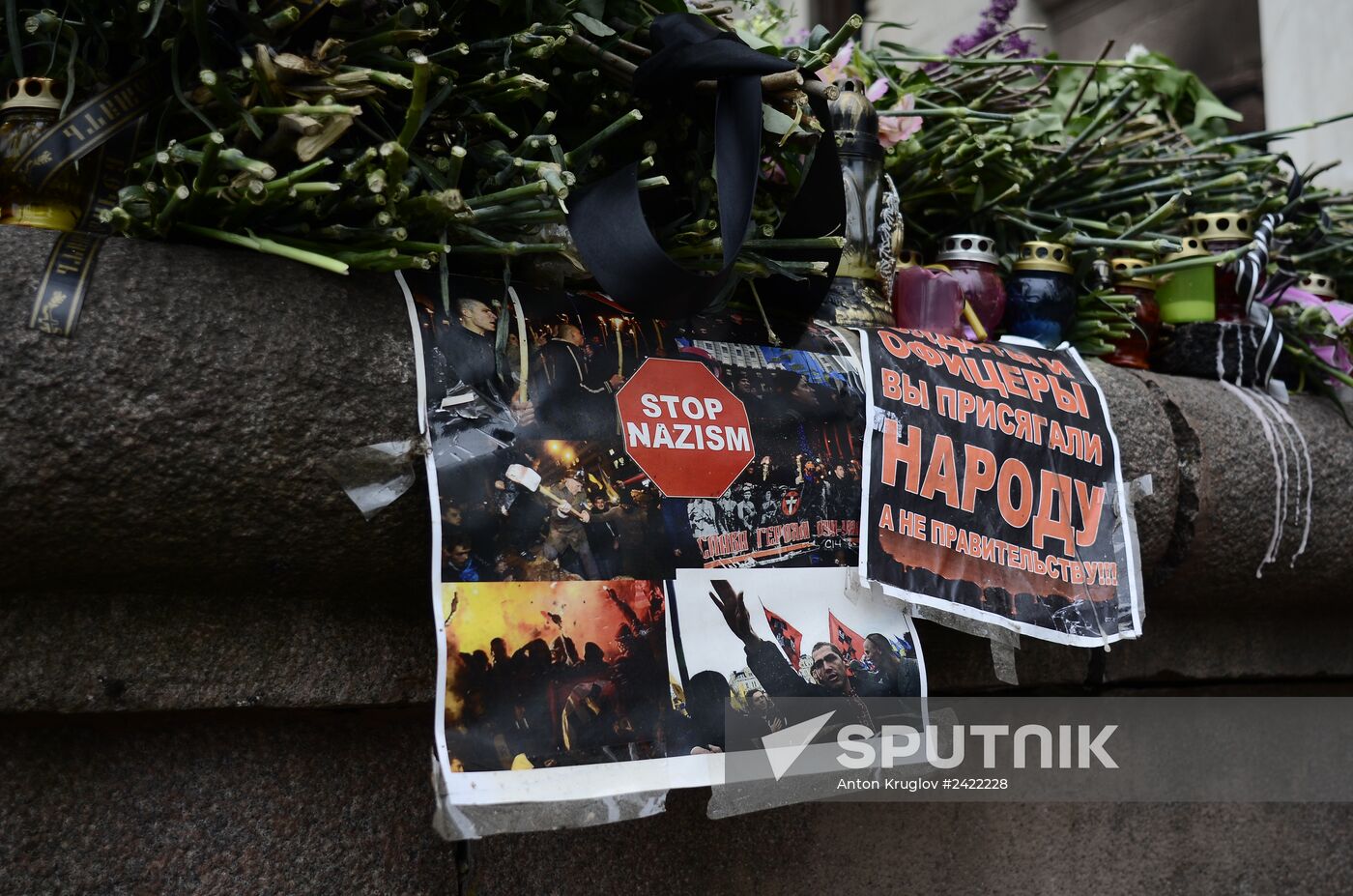 Flowers to commemorate memory of those who died from fire at Odessa's House of Trade Unions