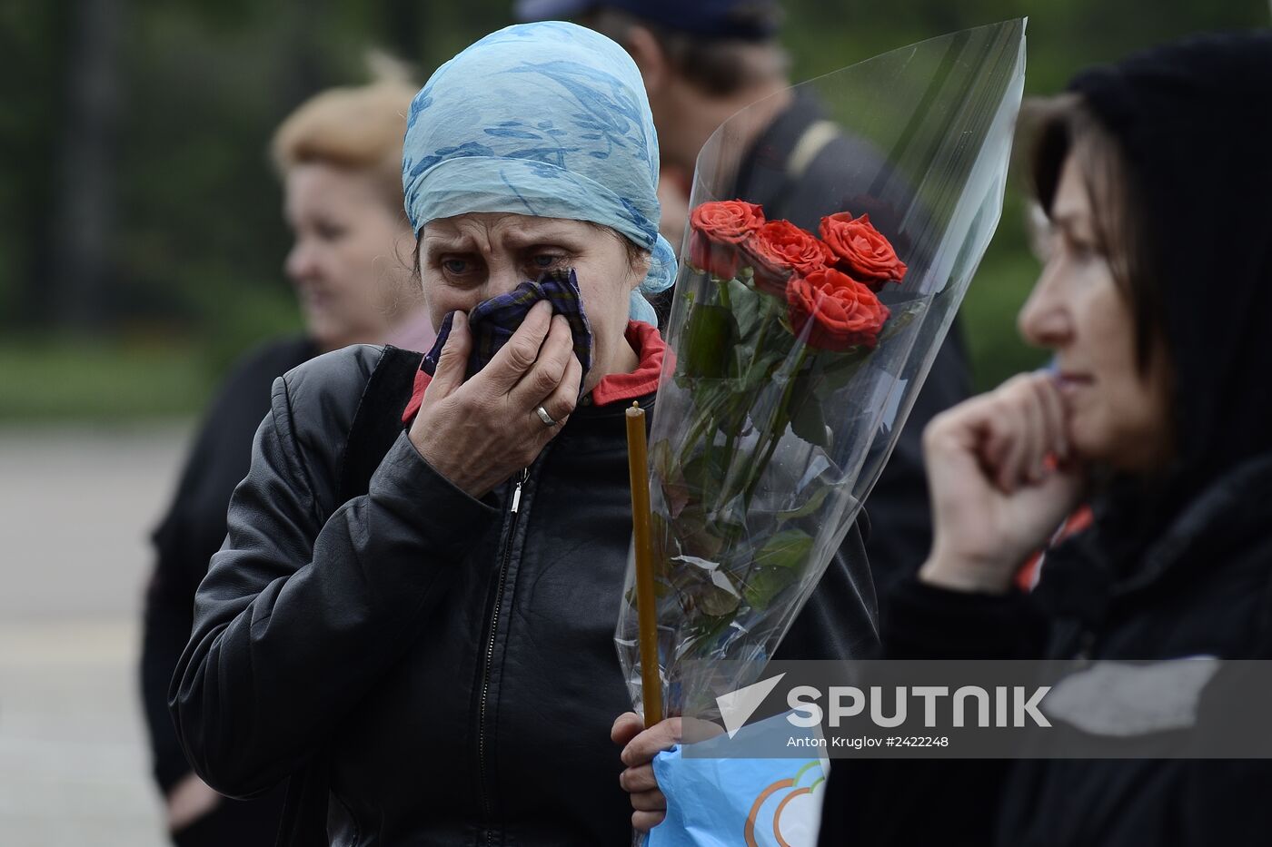 Flowers to commemorate memory of those who died from fire at Odessa's House of Trade Unions