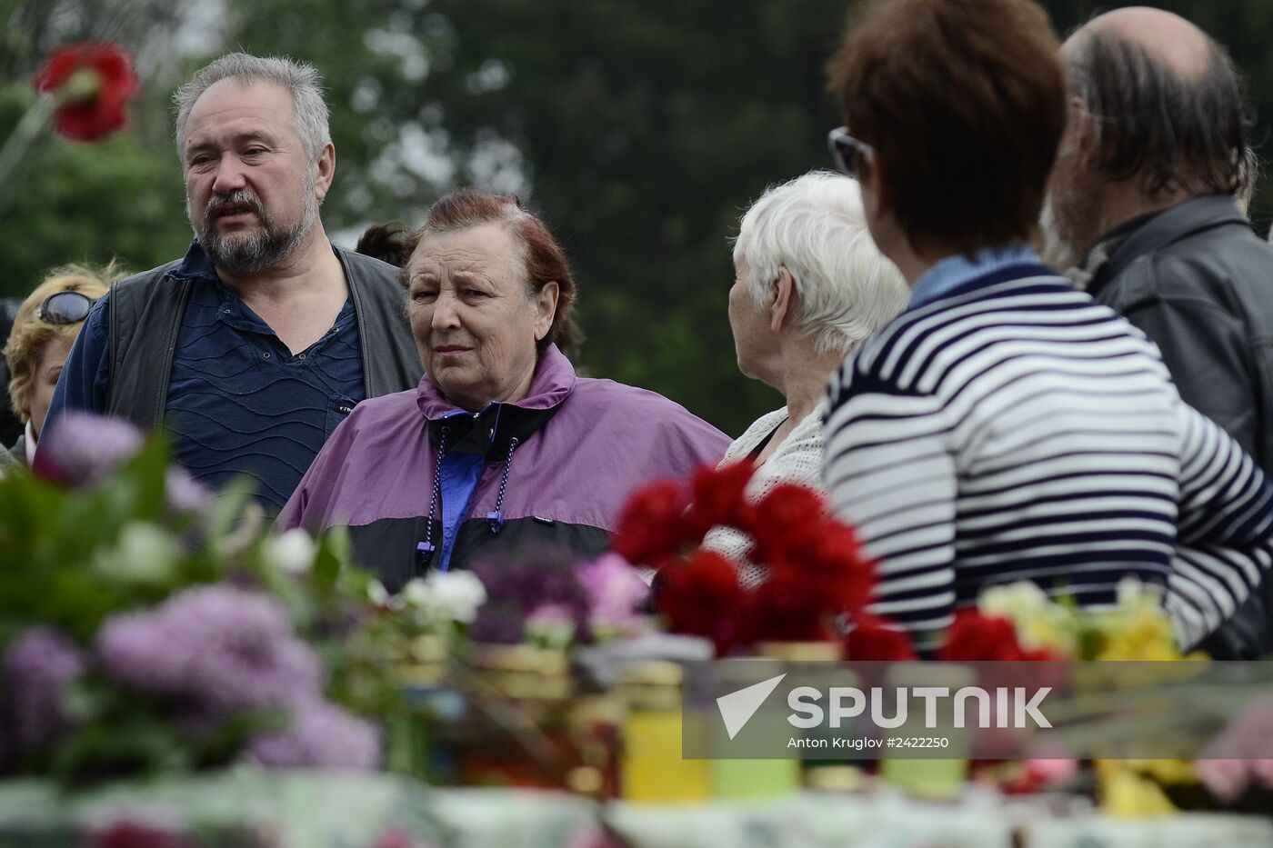 Flowers to commemorate memory of those who died from fire at Odessa's House of Trade Unions