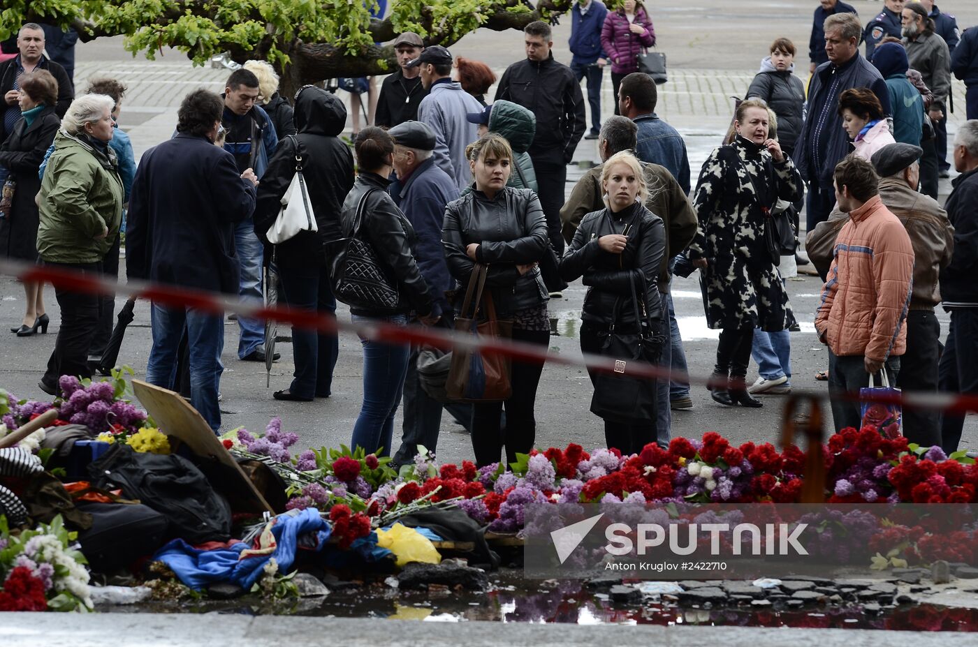 Odessits bring flowers in memory of people killed by fire in Trade Unions House