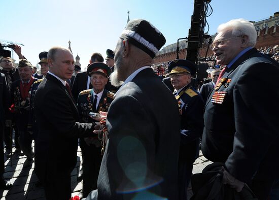 Vladimir Putin and Dmitry Medvedev at Victory Day parade on Red Square