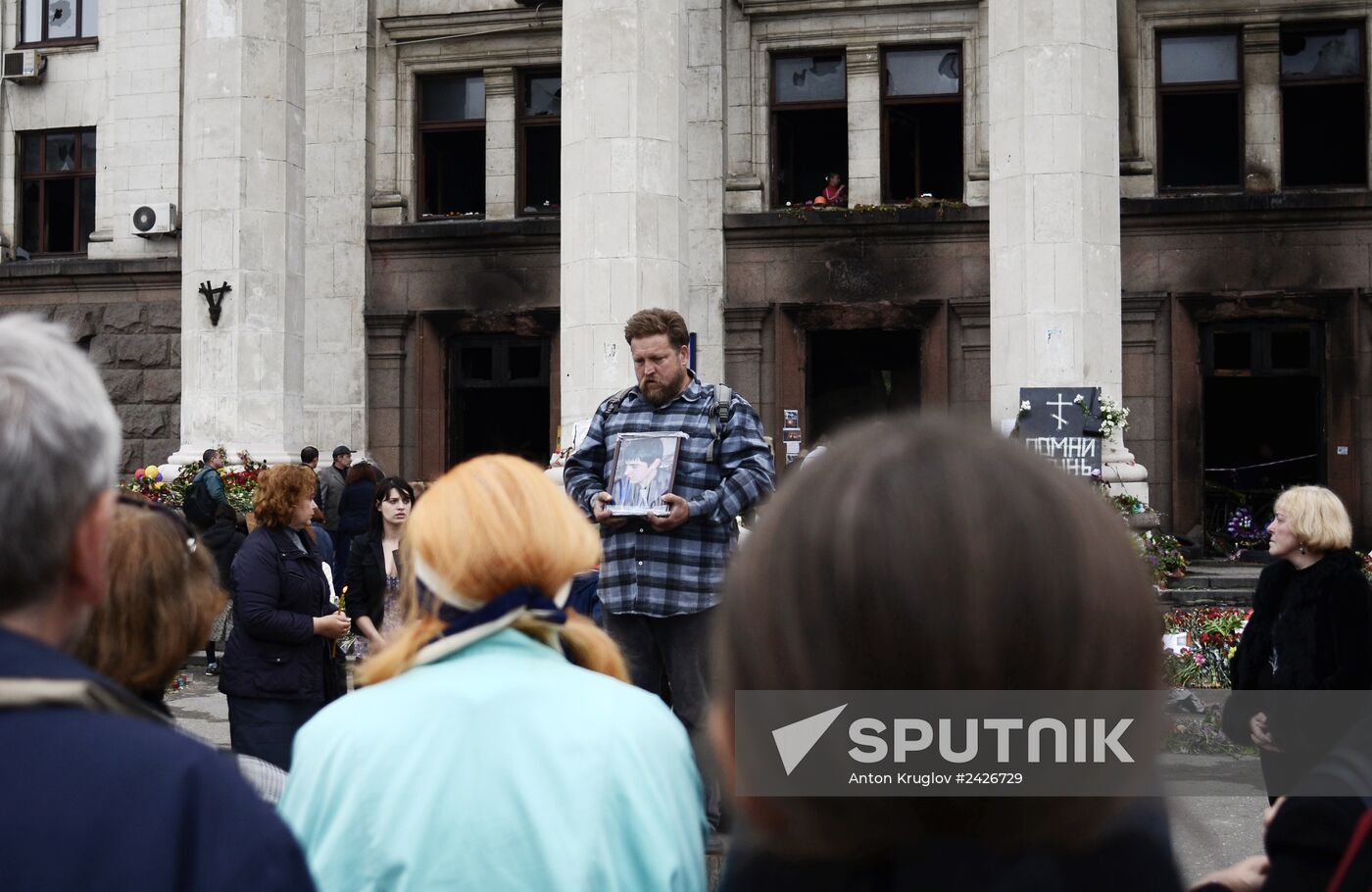 Odessa residents mourn outside Trade Unions House