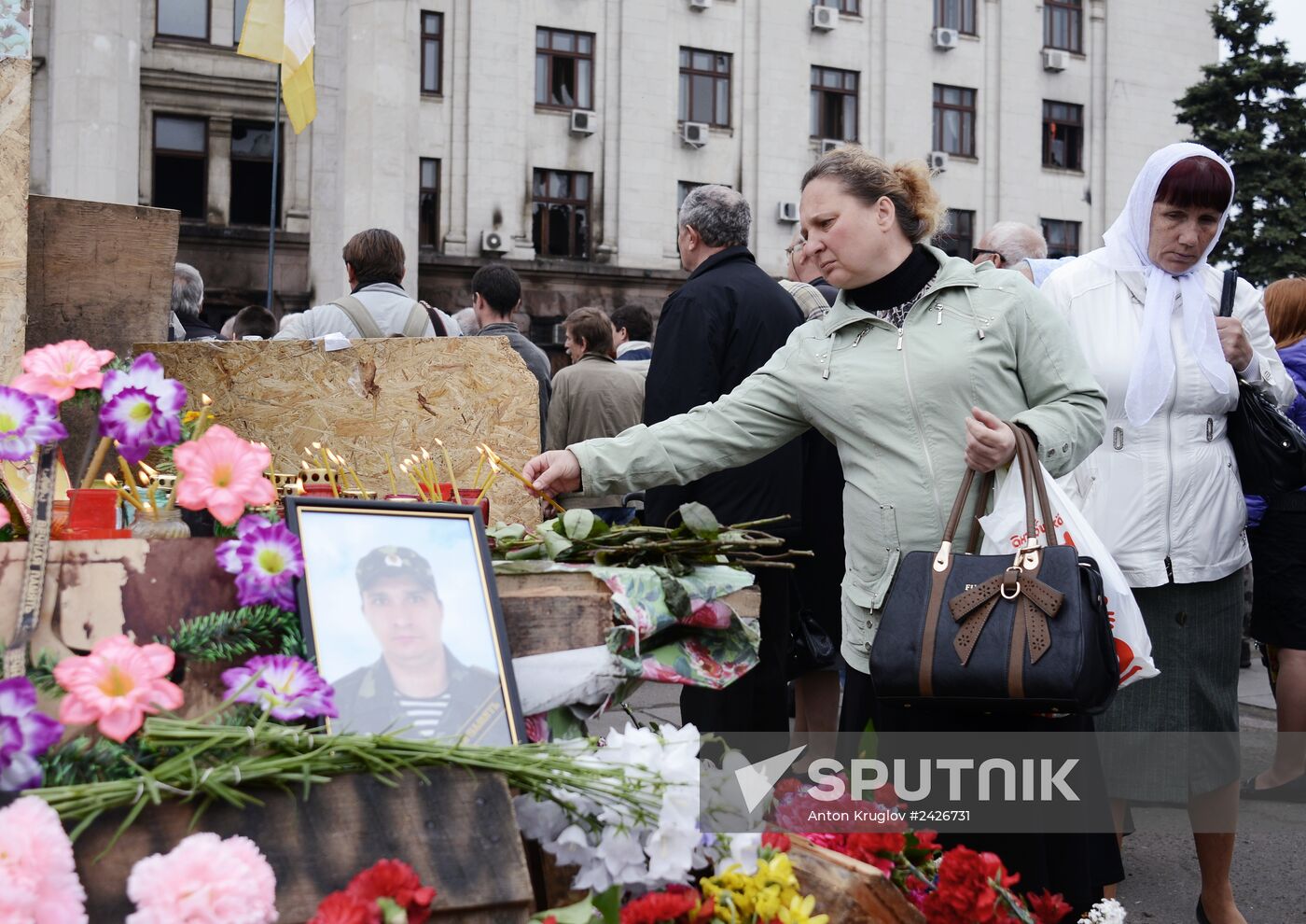 Odessa residents mourn outside Trade Unions House