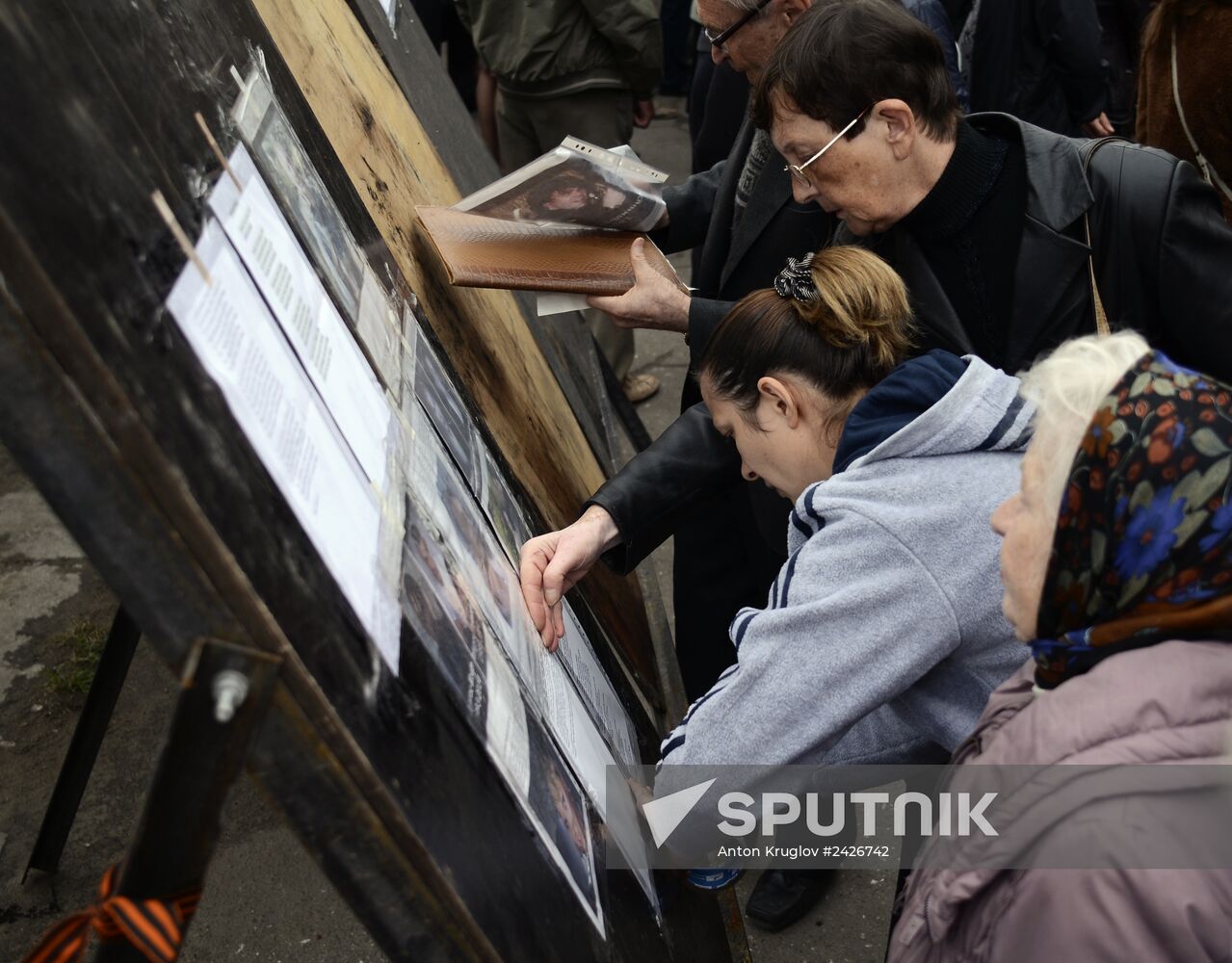 Odessa residents mourn outside Trade Unions House