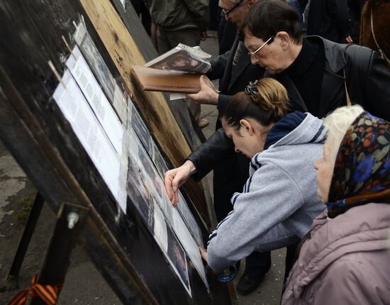 Odessa residents mourn outside Trade Unions House