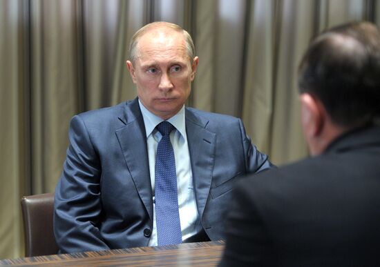 Vladimir Putin meets with Alexander Mikhailov