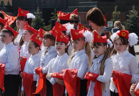 Children join Young Pioneer Organization on Moscow's Red Square