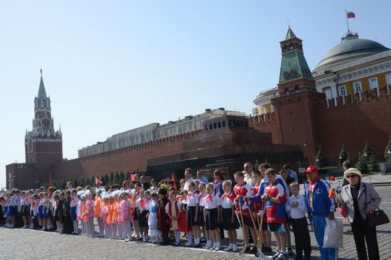 Children join Young Pioneer Organization on Moscow's Red Square