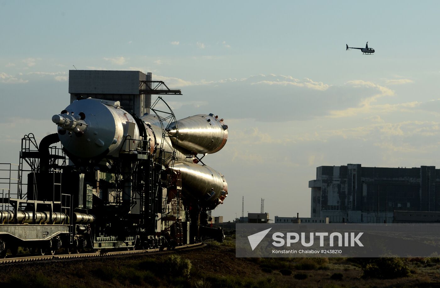 Soyuz-FG rocket with Soyuz TMA-13M spacecraft moved to Baikonur launch pad