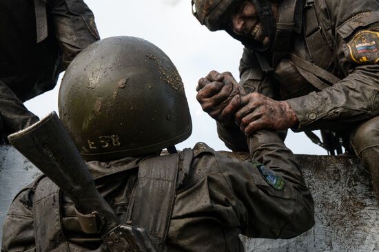 Qualification trials for right to wear maroon beret