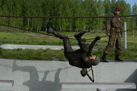 Qualification trials for right to wear maroon beret