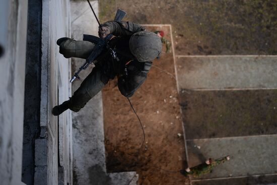 Qualification trials for right to wear maroon beret