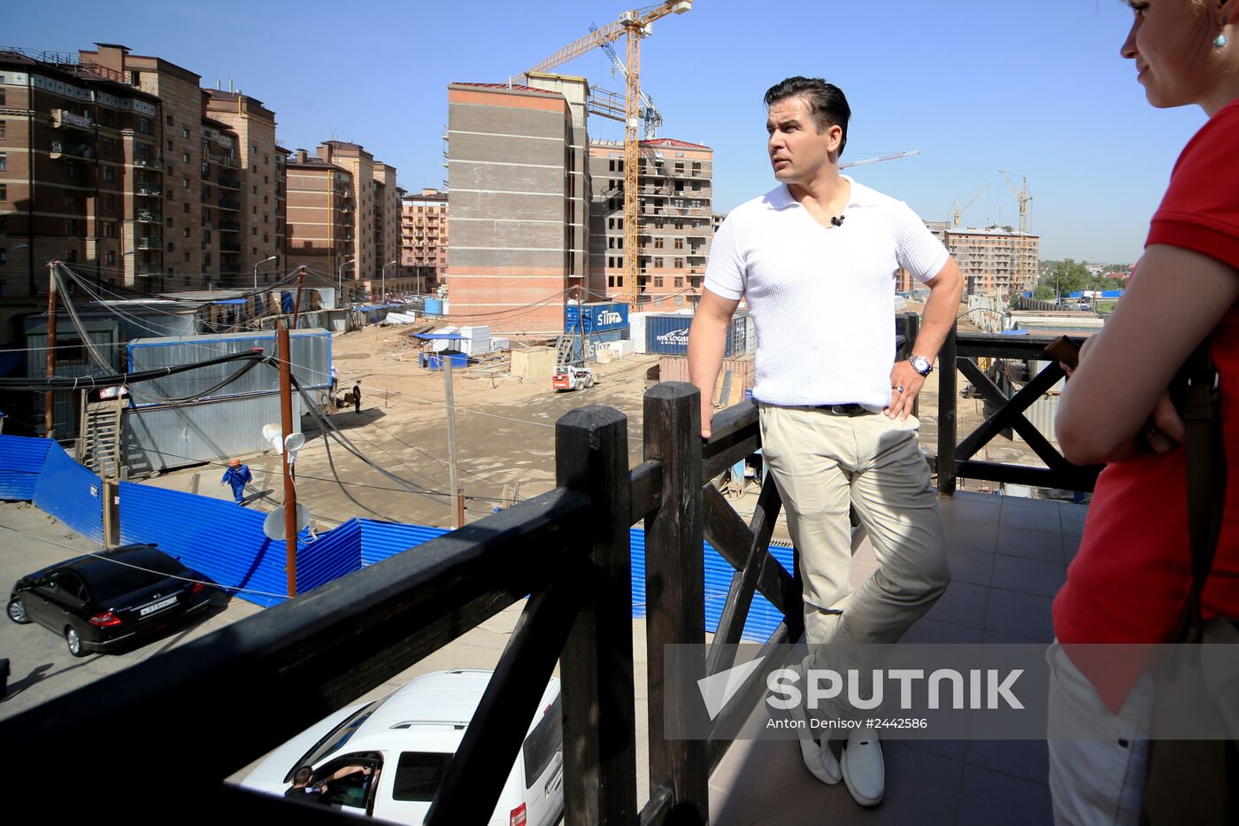 Luger Albert Demchenko shows journalists flat he received as a gift
