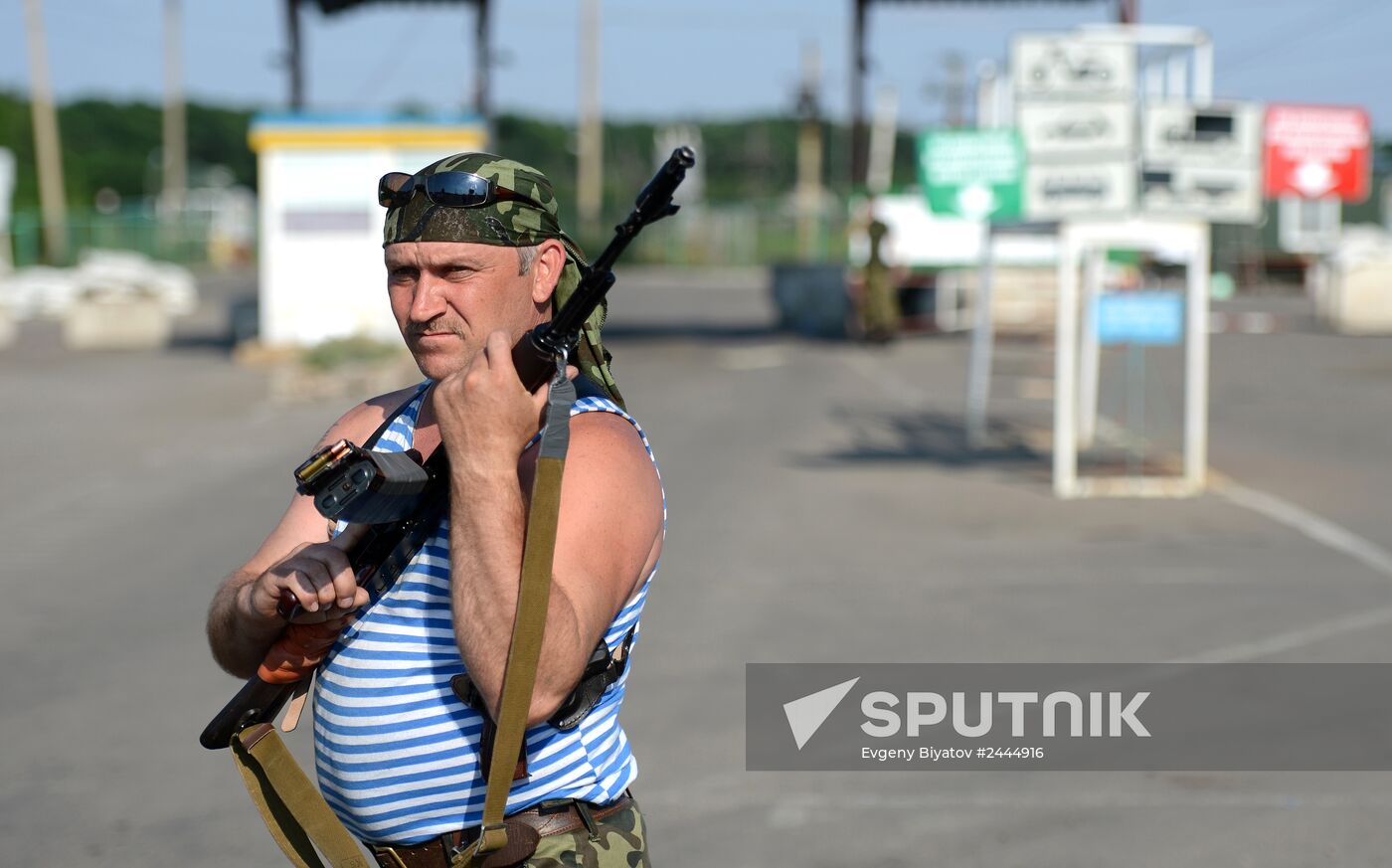 Lugansk Republic's militia at border checkpoint on Lugansk Region's border with Russia