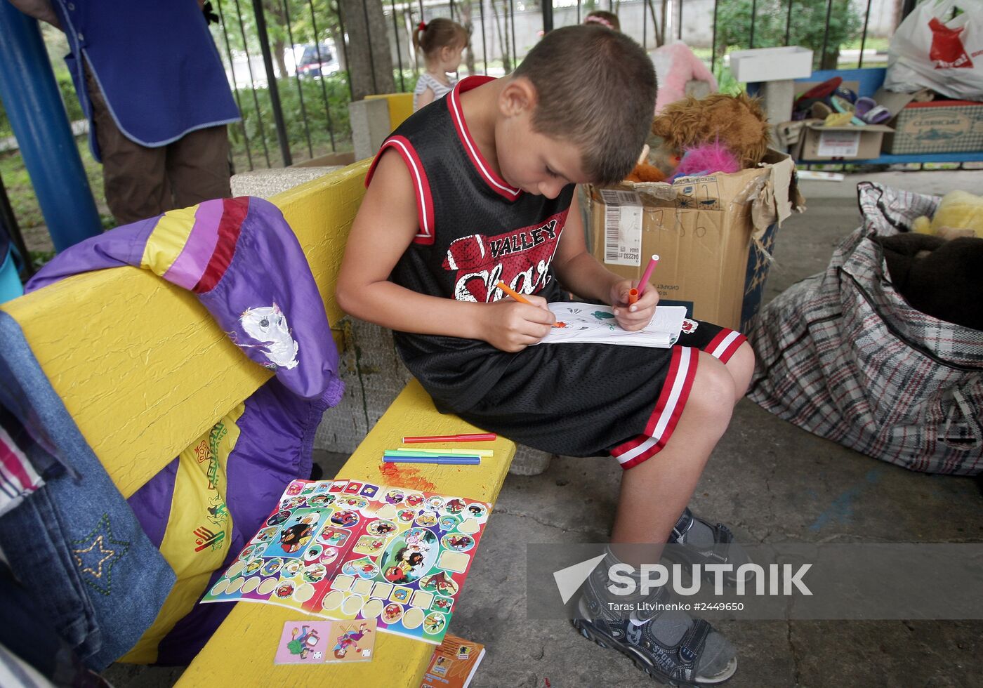 Refugees from Southeastern Ukraine at transit refugee camp at Artek Center