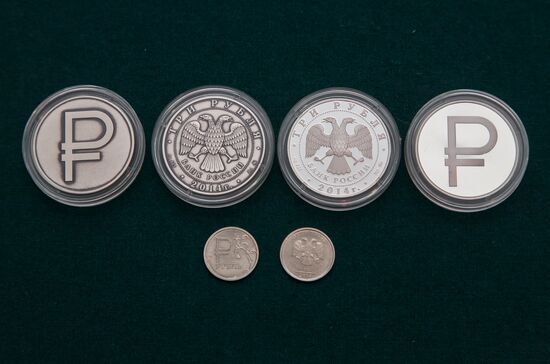 Central Bank issues coins with new rouble symbol
