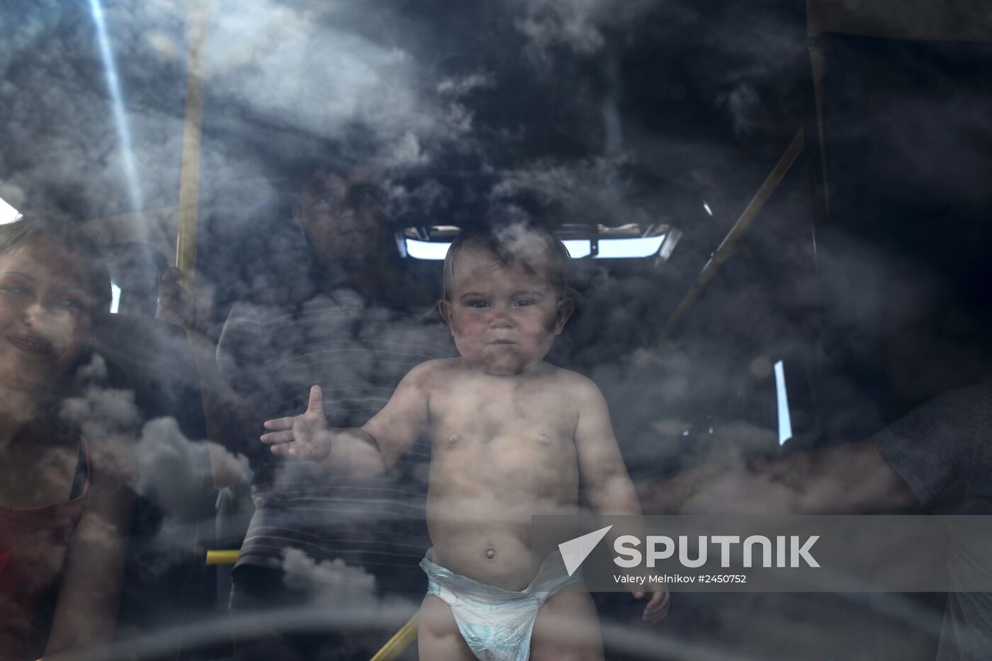 Refugees at Izvarino border checkpoint in Lugansk Region
