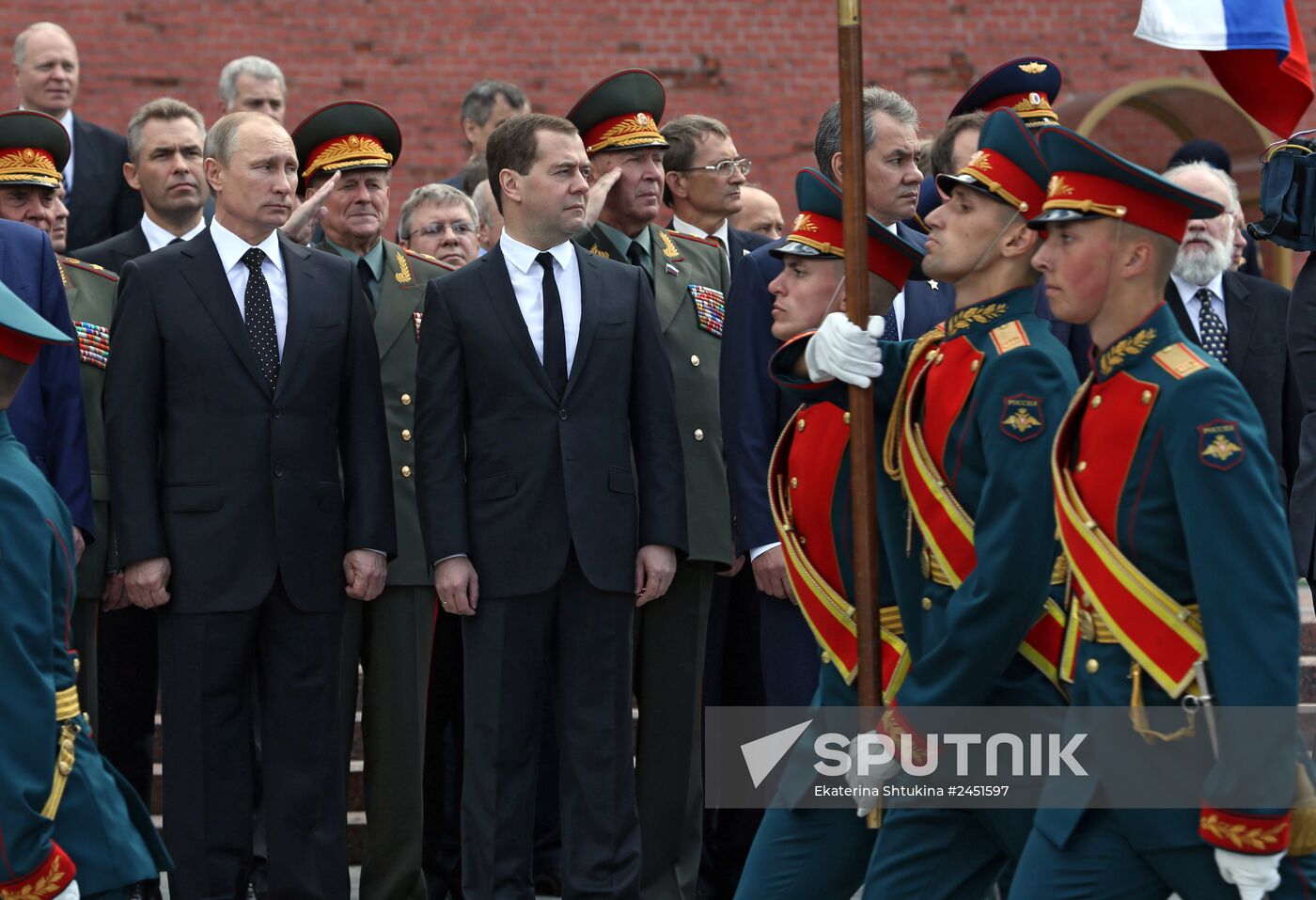 Putin and Medvedev lay flowers at the Tomb of the Unknown Soldier at the Kremlin Wall