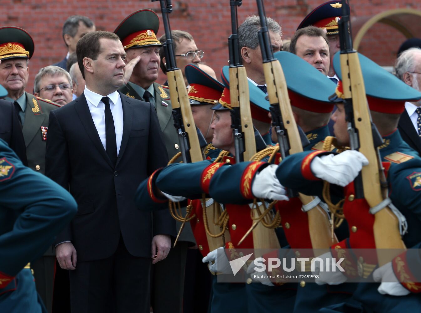 Putin and Medvedev lay flowers at the Tomb of the Unknown Soldier at the Kremlin Wall