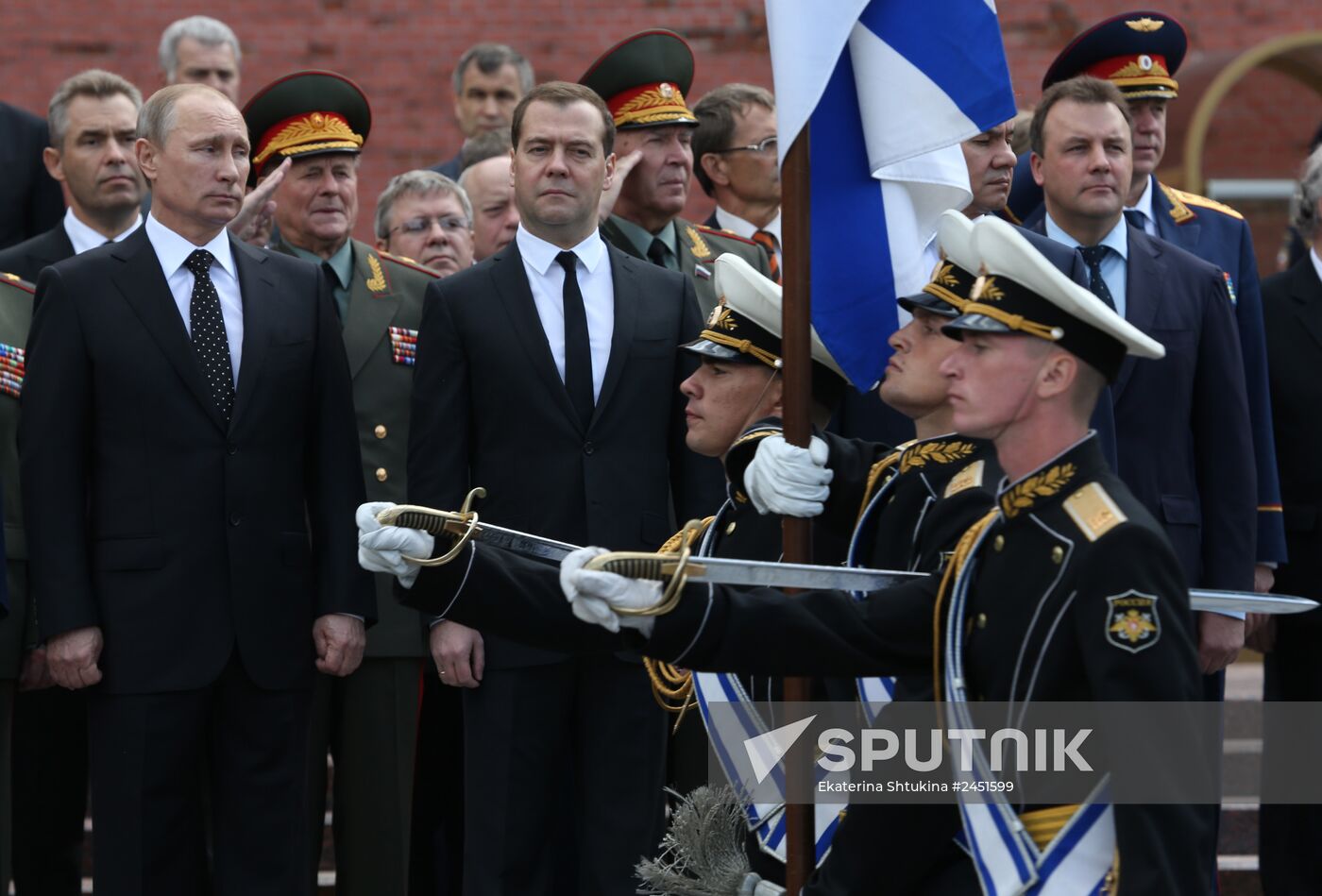 Putin and Medvedev lay flowers at the Tomb of the Unknown Soldier at the Kremlin Wall