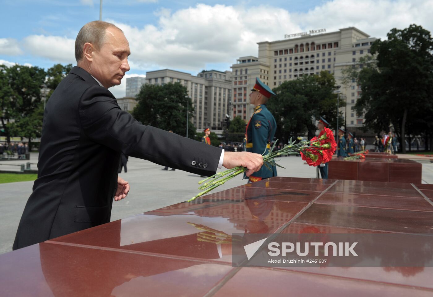 Vladimir Putin and Dmitry Medvedev lay flowers at Tomb of Unknown Soldier near Kremlin Wall