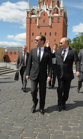 Vladimir Putin and Dmitry Medvedev lay flowers at Tomb of Unknown Soldier near Kremlin Wall