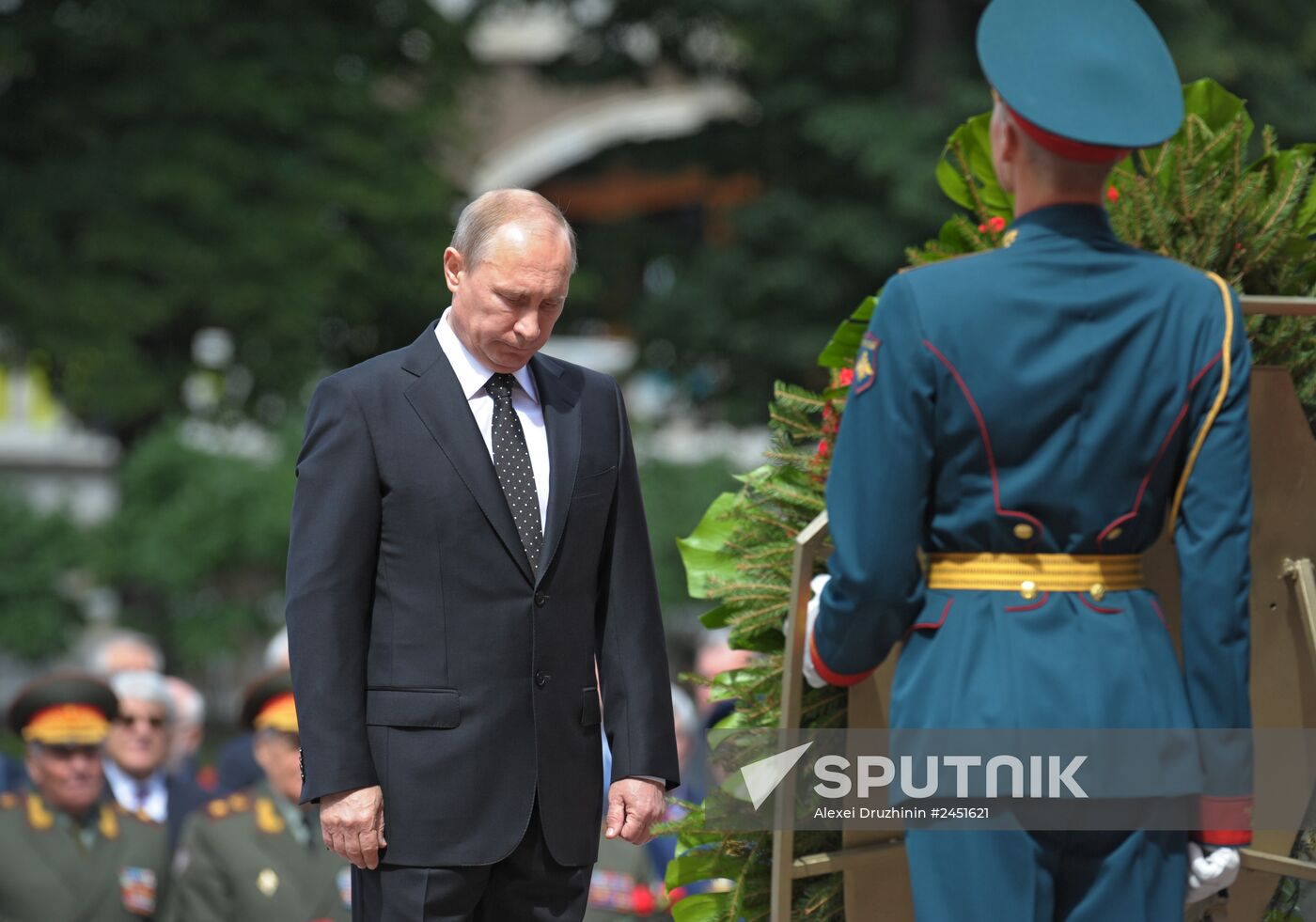 Vladimir Putin and Dmitry Medvedev lay flowers at Tomb of Unknown Soldier near Kremlin Wall