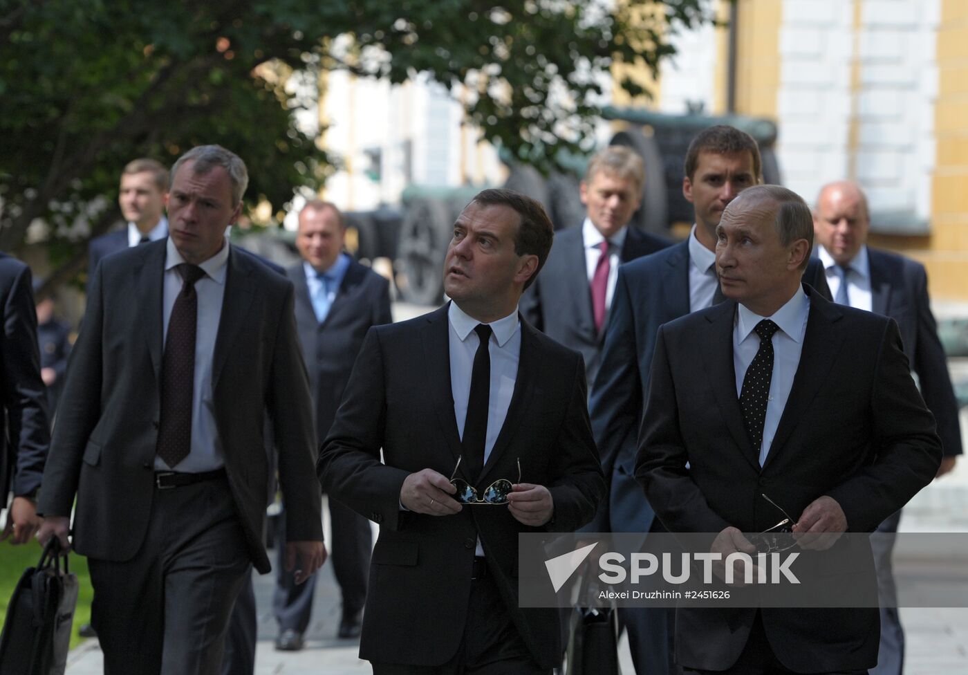 Vladimir Putin and Dmitry Medvedev lay flowers at Tomb of Unknown Soldier near Kremlin Wall