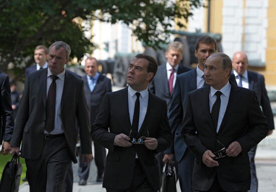 Vladimir Putin and Dmitry Medvedev lay flowers at Tomb of Unknown Soldier near Kremlin Wall