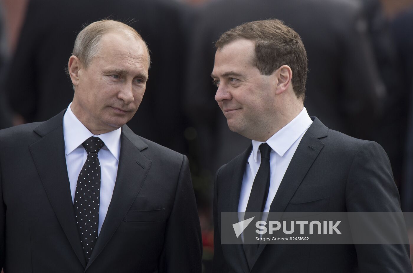 Vladimir Putin and Dmitry Medvedev lay flowers at Tomb of Unknown Soldier near Kremlin Wall