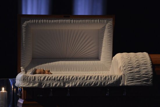 Paying last respects to TV cameraman Anatoly Klyan