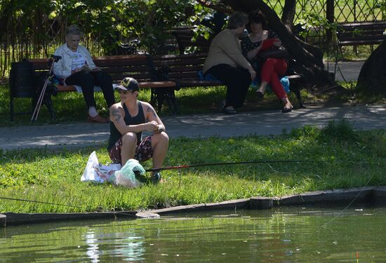 People relax at Moscow's Vorontsovsky Park