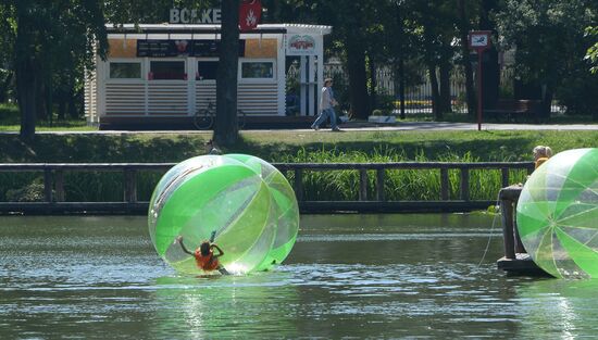 People relax at Moscow's Vorontsovsky Park