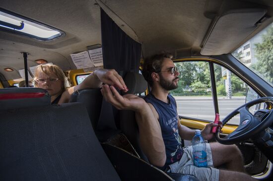The work of a shuttle taxi driver in Omsk, Russia
