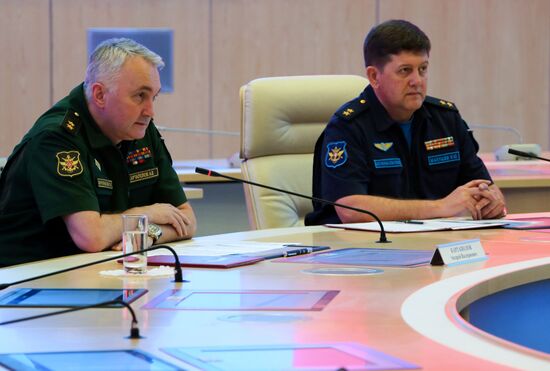 Andrei Kartapolov and Igor Makushev at news conference
