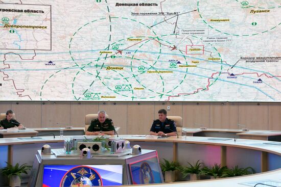 Andrei Kartapolov and Igor Makushev at news conference