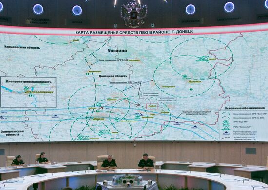 Andrei Kartapolov and Igor Makushev at news conference