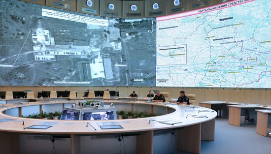 Andrei Kartapolov and Igor Makushev at news conference