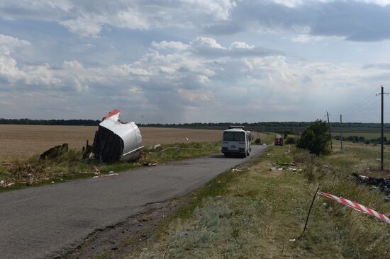 OSCE employees and experts work at Malaysia Airlines Boeing 777 crash site