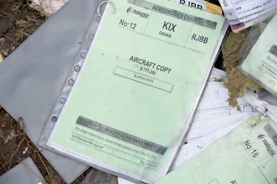 OSCE employees and experts work at Malaysia Airlines Boeing 777 crash site