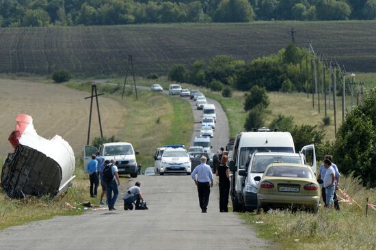 OSCE employees and experts work at Malaysia Airlines Boeing 777 crash site
