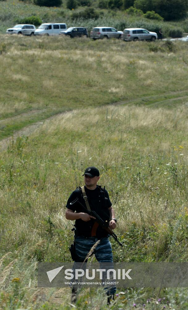 OSCE employees and experts work at Malaysia Airlines Boeing 777 crash site