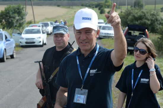 OSCE employees and experts work at Malaysia Airlines Boeing 777 crash site